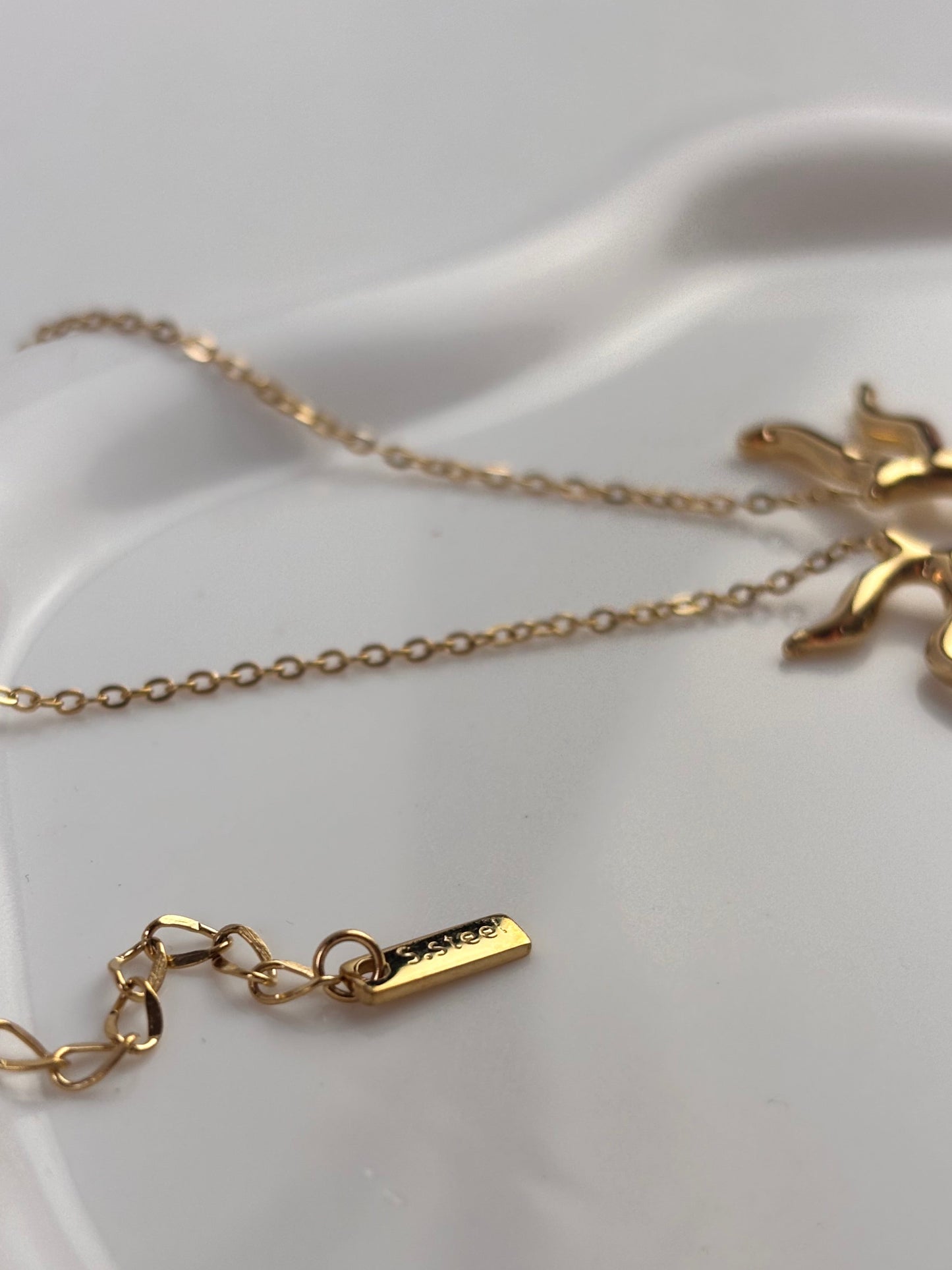 COLLAR - STELLA BAÑADO EN ORO 18KT