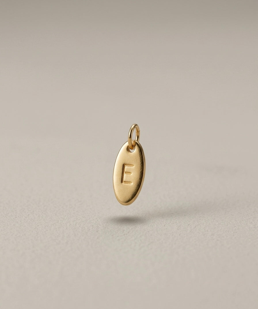 DIJE DE LETRA INICIAL ovalado