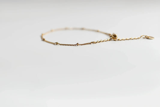 PULSERA FINA CON PEQUEÑAS CUENTAS EN ACERO INOXIDABLE 316L