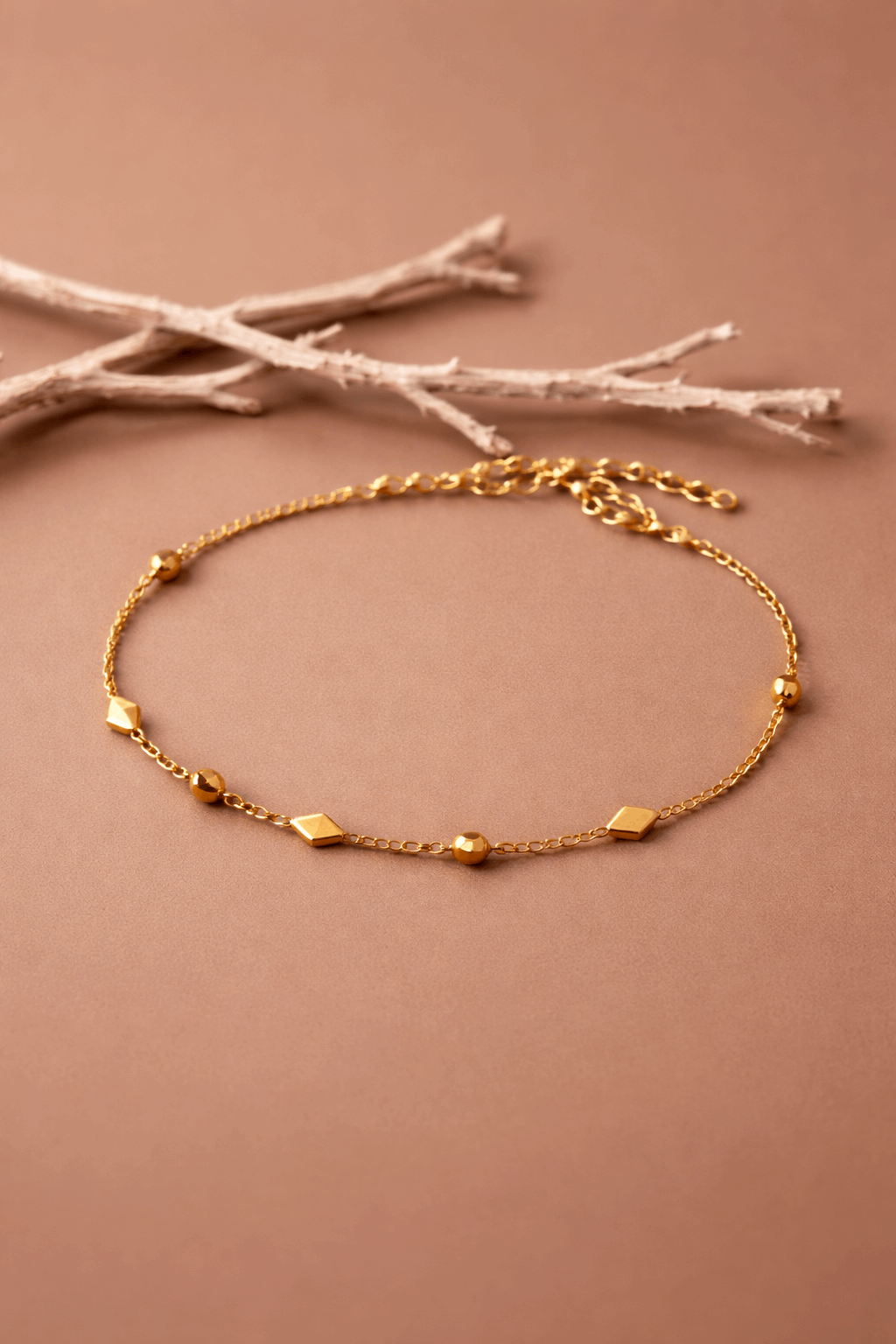PULSERA CON ESLABONES DE ARROZ DORADA