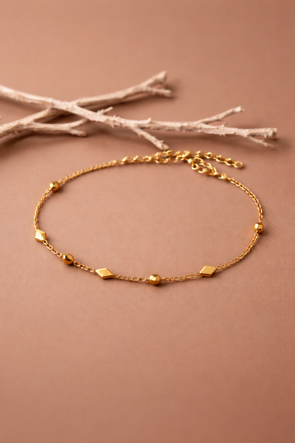 PULSERA CON ESLABONES DE ARROZ DORADA