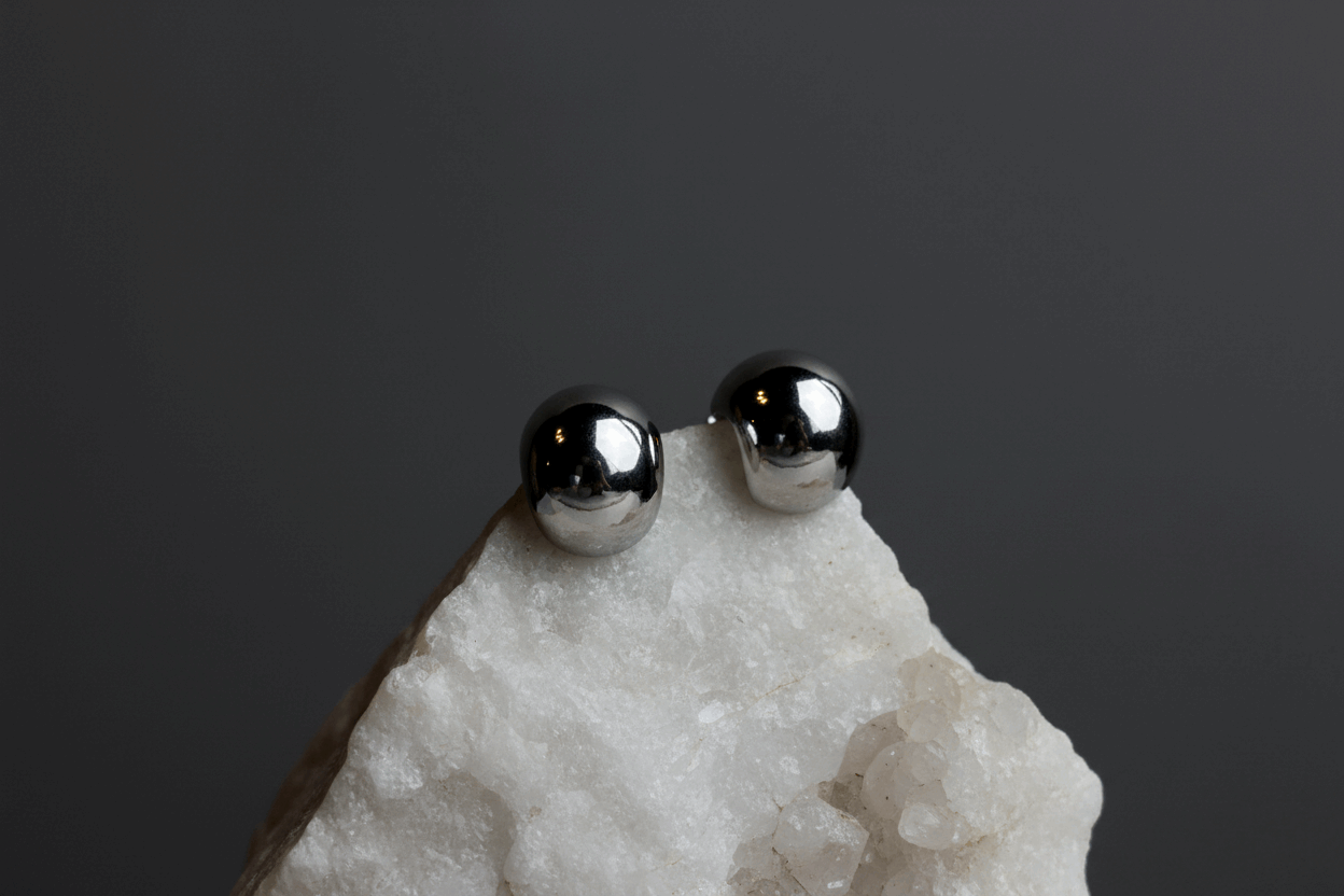 PENDIENTES MEDIA LUNA EN ACERO INOXIDABLE 316L CON ACABADO BRILLANTE - COLOR PLATA