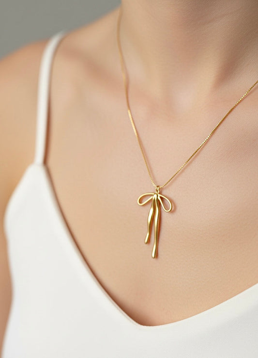 COLLAR LAZO - VELVET BOW CON BAÑO DE ORO 18 KT SOBRE ACERO 316L