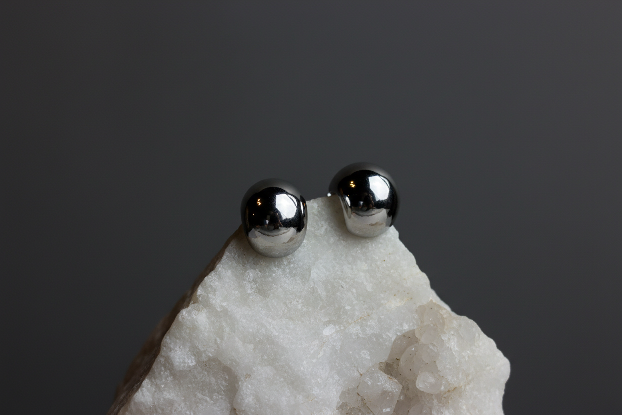 PENDIENTES MEDIA LUNA EN ACERO INOXIDABLE 316L CON ACABADO BRILLANTE - COLOR PLATA