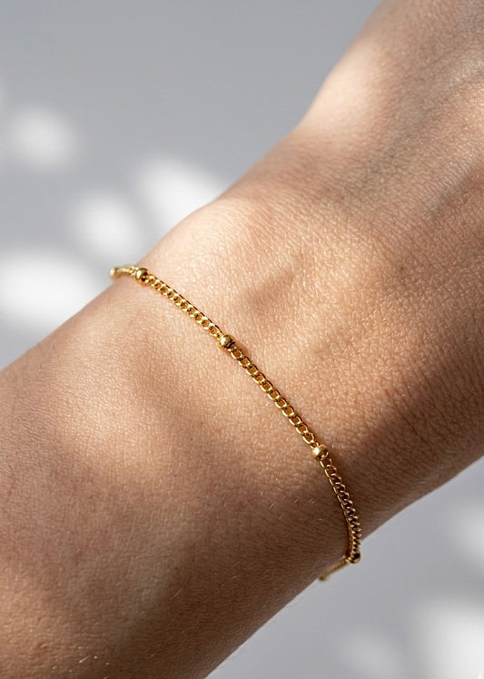 PULSERA FINA CON PEQUEÑAS CUENTAS EN ACERO INOXIDABLE 316L